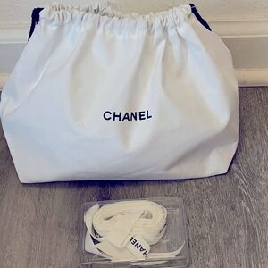 Chanel duster and white ribbon